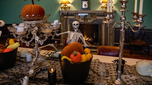 Wimpole Hall Dining Room is decked out with skeletons and spooky Halloween decorations
